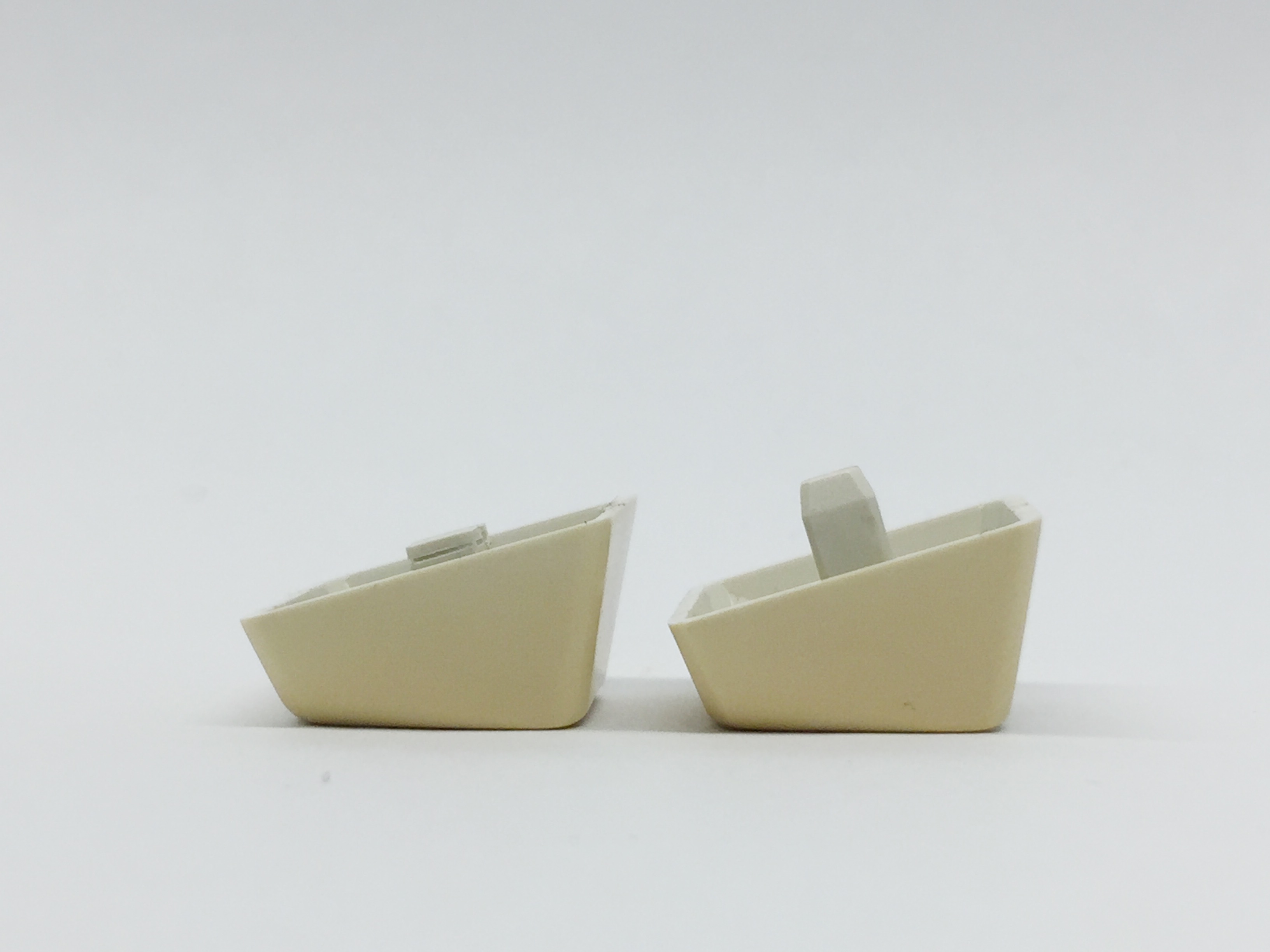 In order to try to reduce the height of the switch + adapter + keycap I decided to file down the original stem inside the keycap(s). For all I know I need to file away even more, but this is a start.