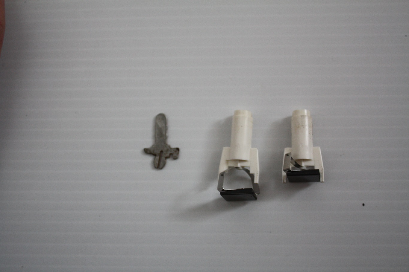 IBM 5100 Beam Spring - key switch. Key pressed position in centre.  Not pressed on far right.